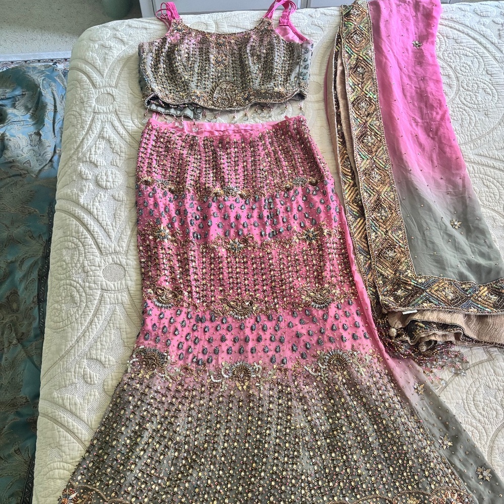Pink and grey mermaid lehenga with heavy embellishments